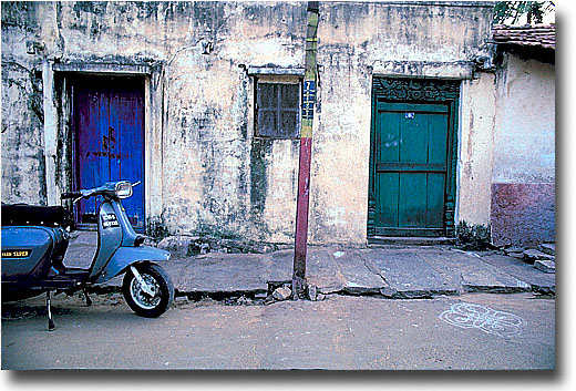 Motor Scooter on the Alley, with Kolam